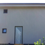 Haus verputzt Nordansicht mit Eingang